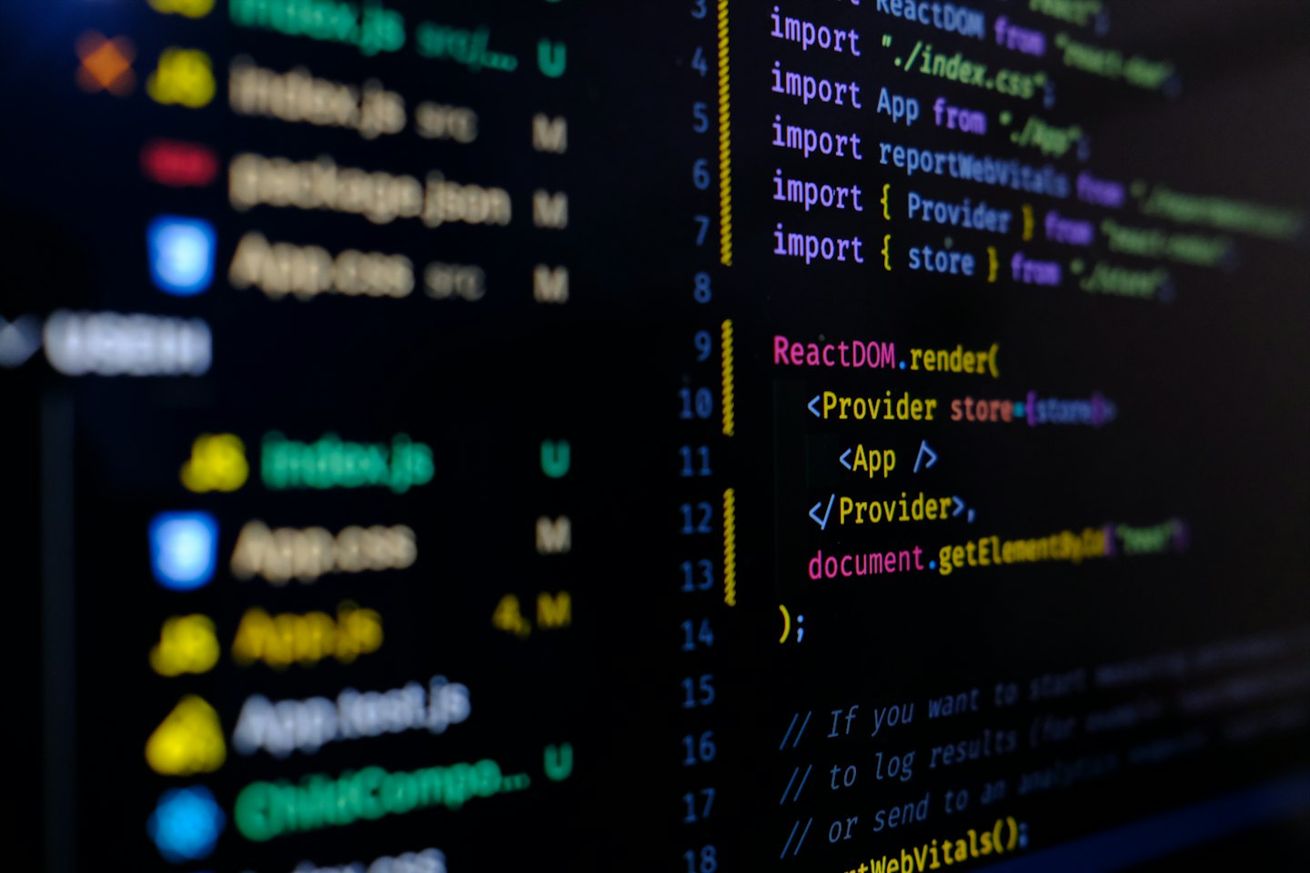 Computer screen displaying colorful code with syntax highlighting.